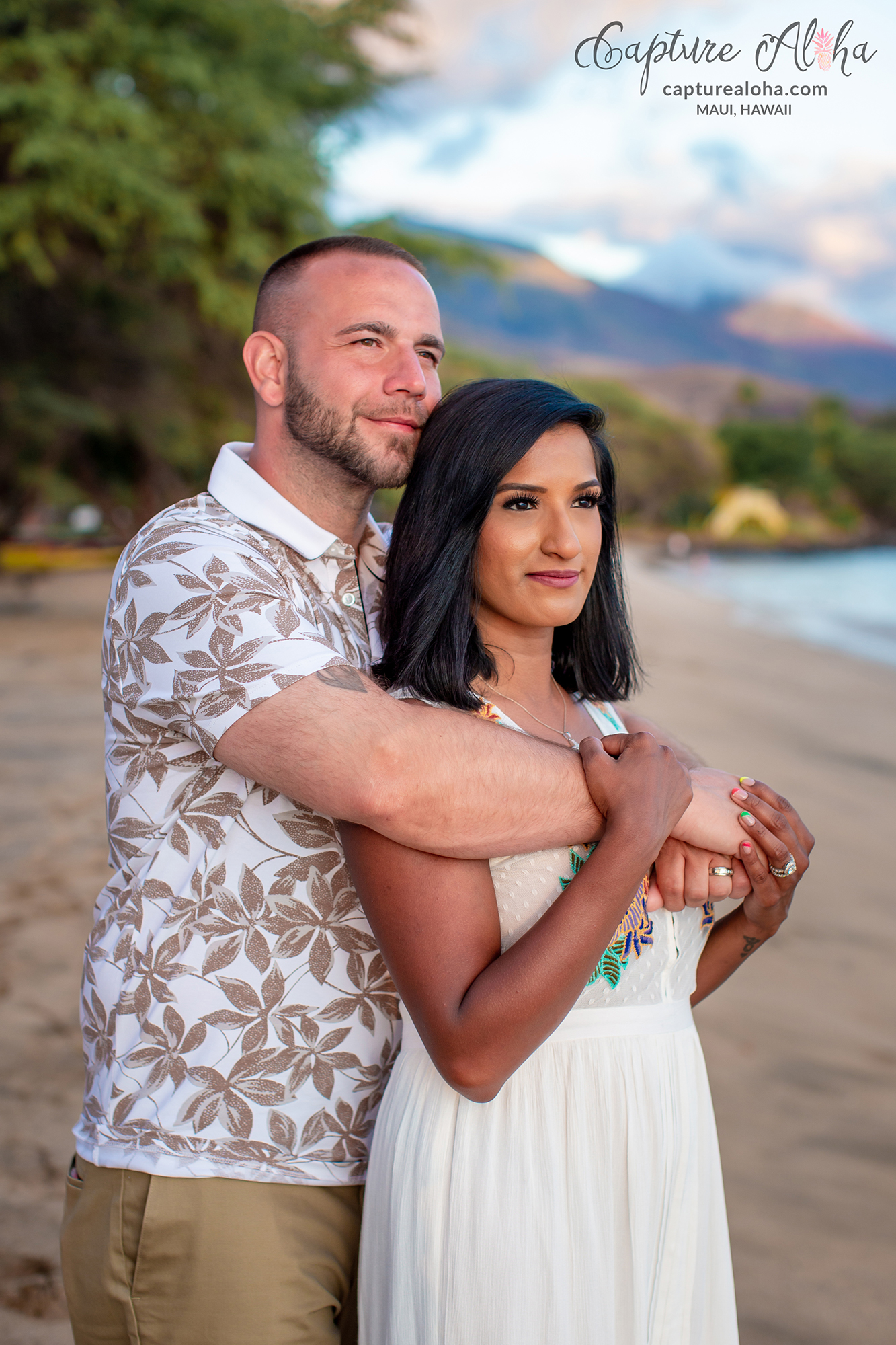 Close up picture of a couple on a beach in Maui during sunset