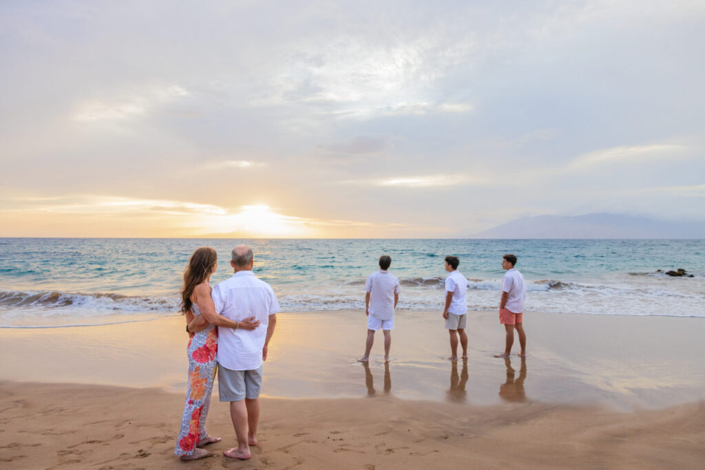 Maui sunset session with rich orange and purple sky