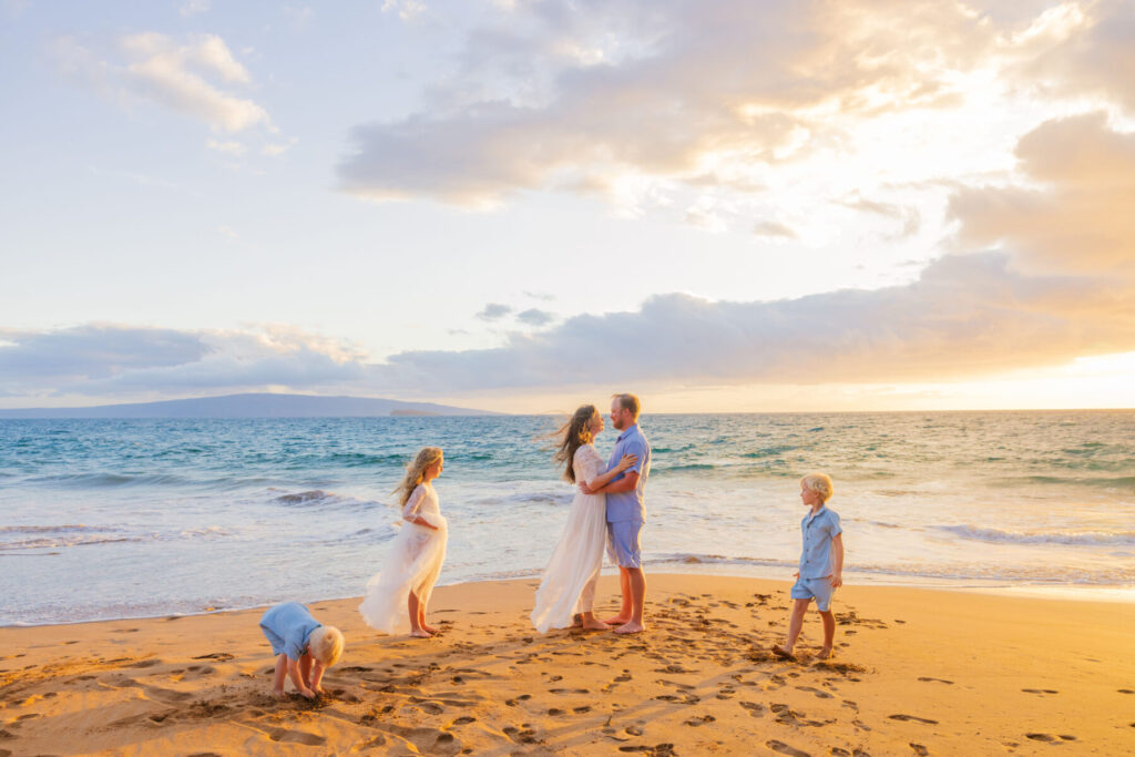 Candid family photo at Po‘olenalena Beach with soft sunset light