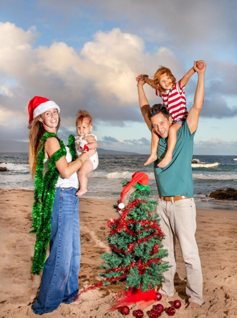 family group photo in front of turquoise Maui waters, ideal for holiday cards