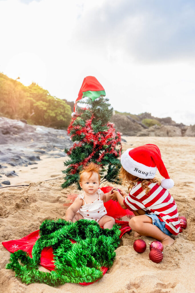 family group photo in front of turquoise Maui waters, ideal for holiday cards