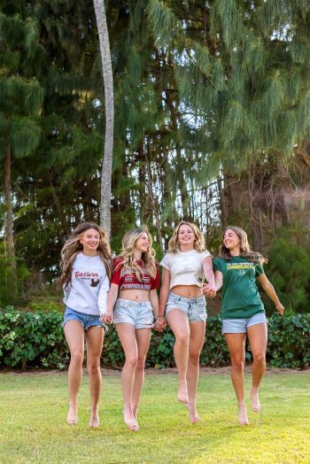 Group of girls laughing together during a Maui beach session