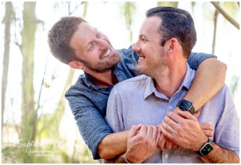 Engagement photoshoot Maui – same-sex couple - joy-filled moment of shared laughter.
