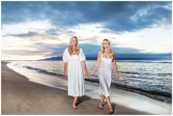 Family photoshoot in Maui – mom and daughter posing in matching dresses.