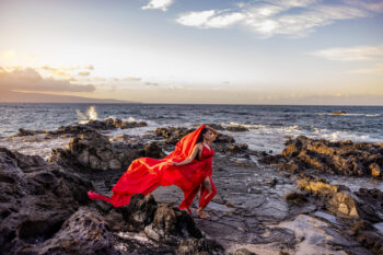 Maui flying dress photographer – gown flowing in the wind on cliffs.