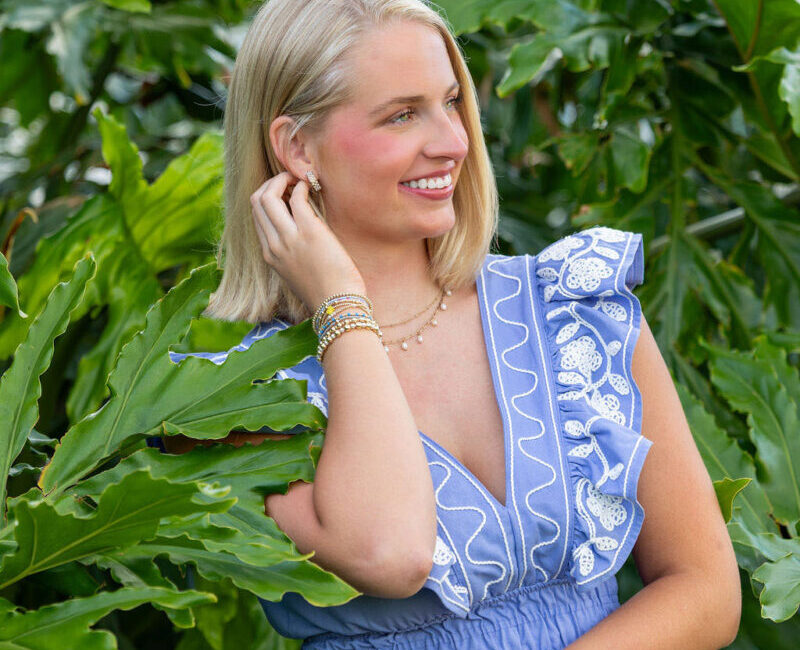 Close-up among lush greenery, soft natural light portrait, Maui.