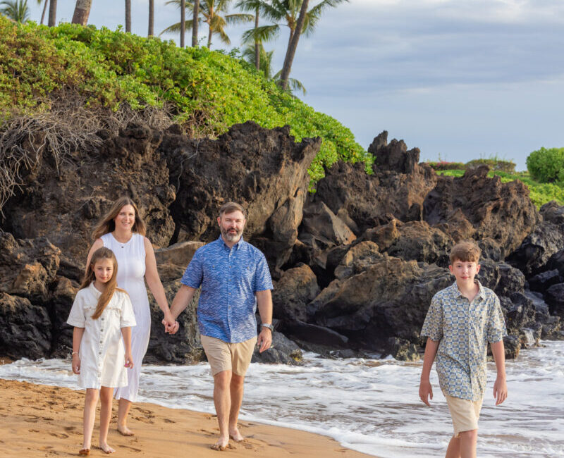 Maui family photographer – parents walking with kids at sunset on Maluaka Beach