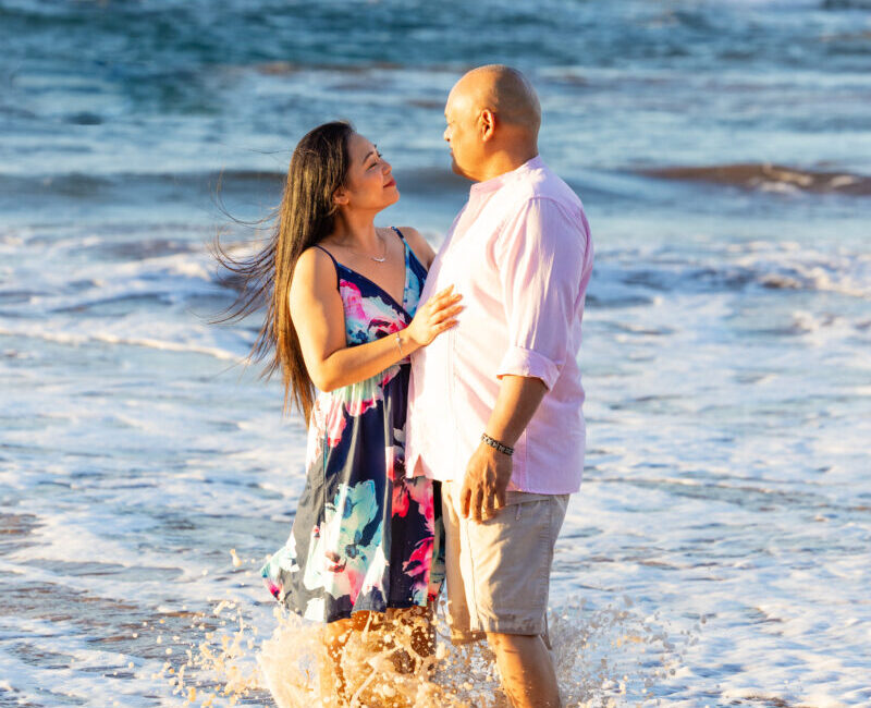 Couples session in Maui – looking against each other at sunset