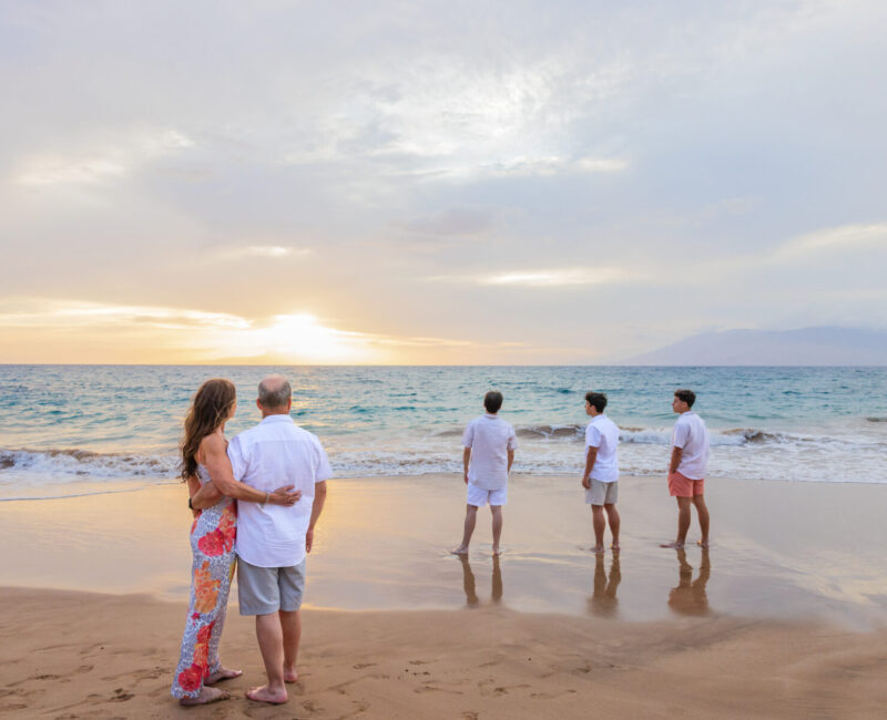 Golden hour Maui beach sunset with warm lighting and dramatic sky Golden hour Maui beach sunset with warm lighting and dramatic sky