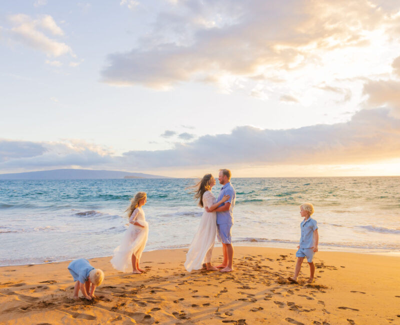 Family session, Poʻolenalena Beach – children play near gentle evening surf.