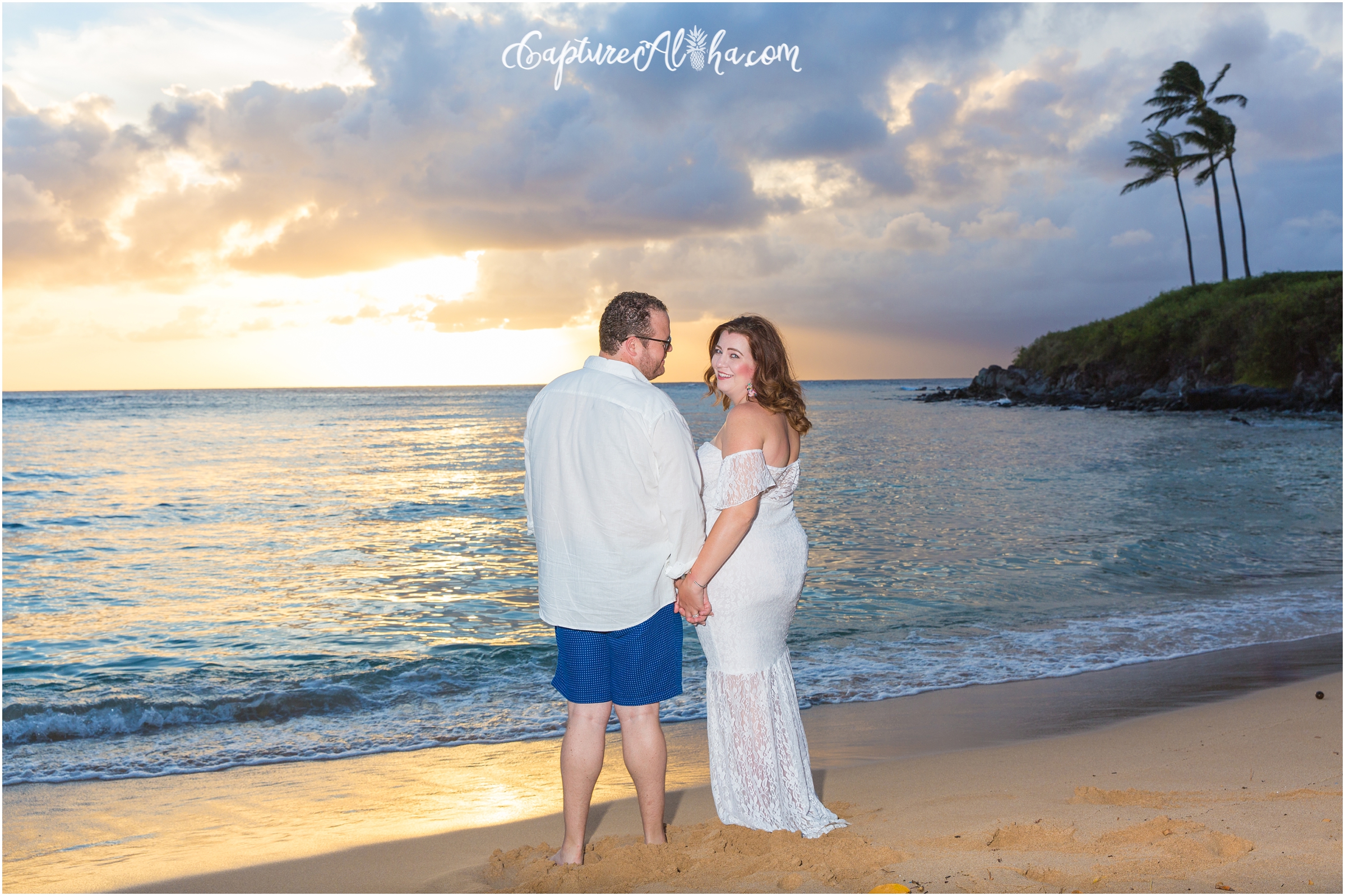 Maui Maternity Photographer at Kapalua Bay with Pregnant couple on the beach at sunset in Maui