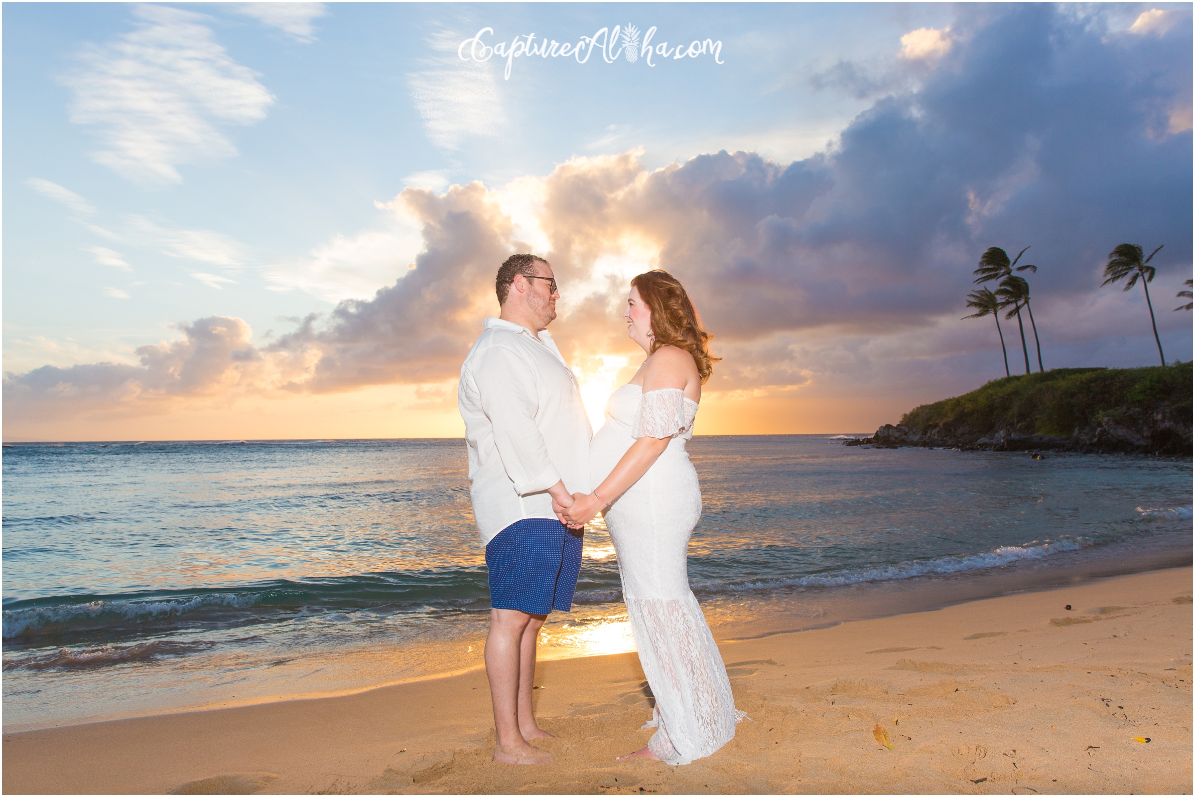 Maui Maternity Photographer at Kapalua Bay with Pregnant couple on the beach at sunset in Maui
