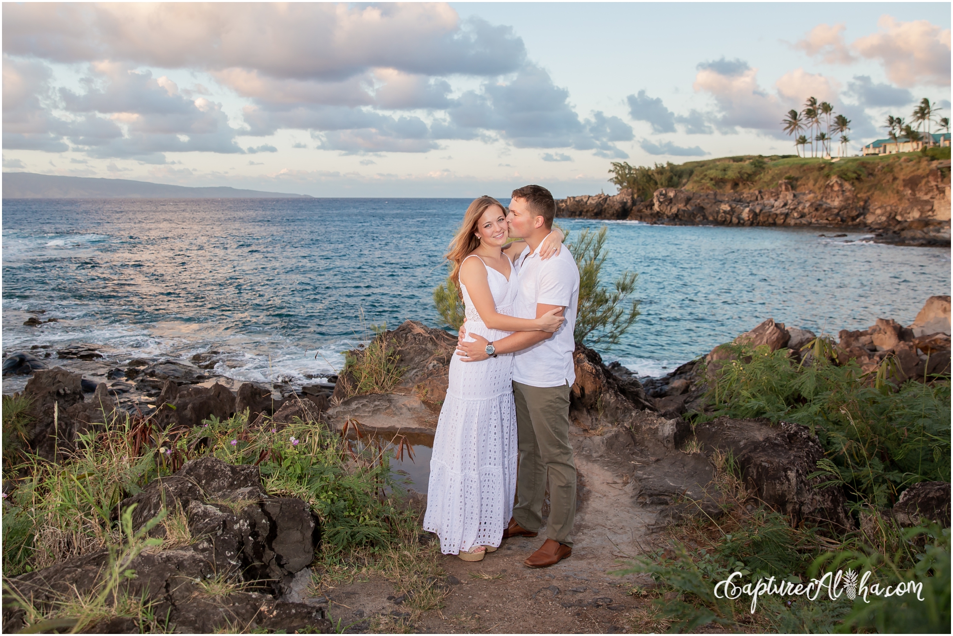 Engagement Photographer Maui with couple at kapalua bay beach on the rocks