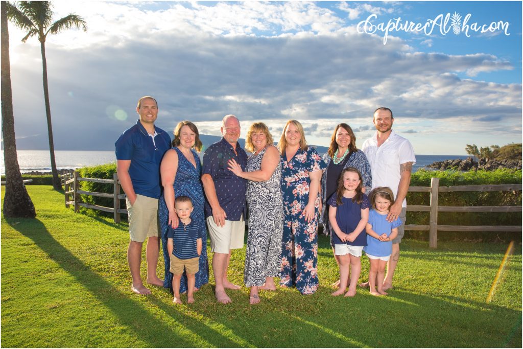 Maui Family Photography at Kapalua Bay with 10 people at sunset on the grass