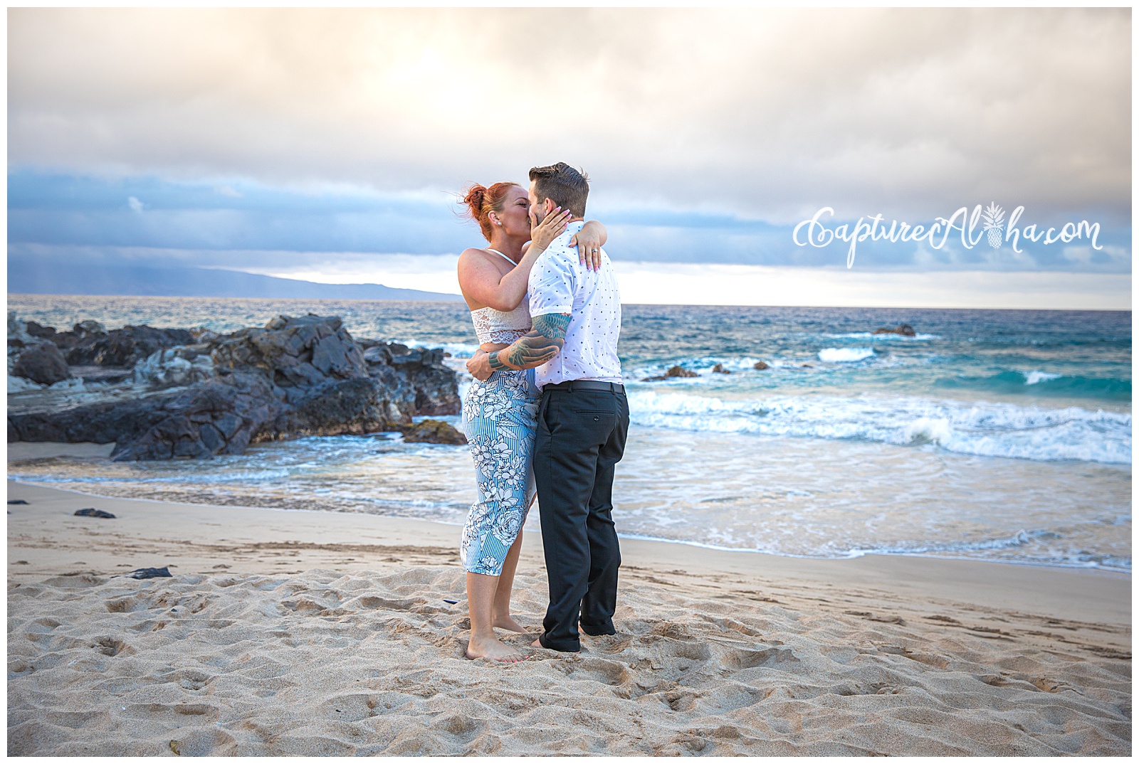 Maui Surprise Proposal Photography at Ironwoods Beach at Sunset, couple kissing