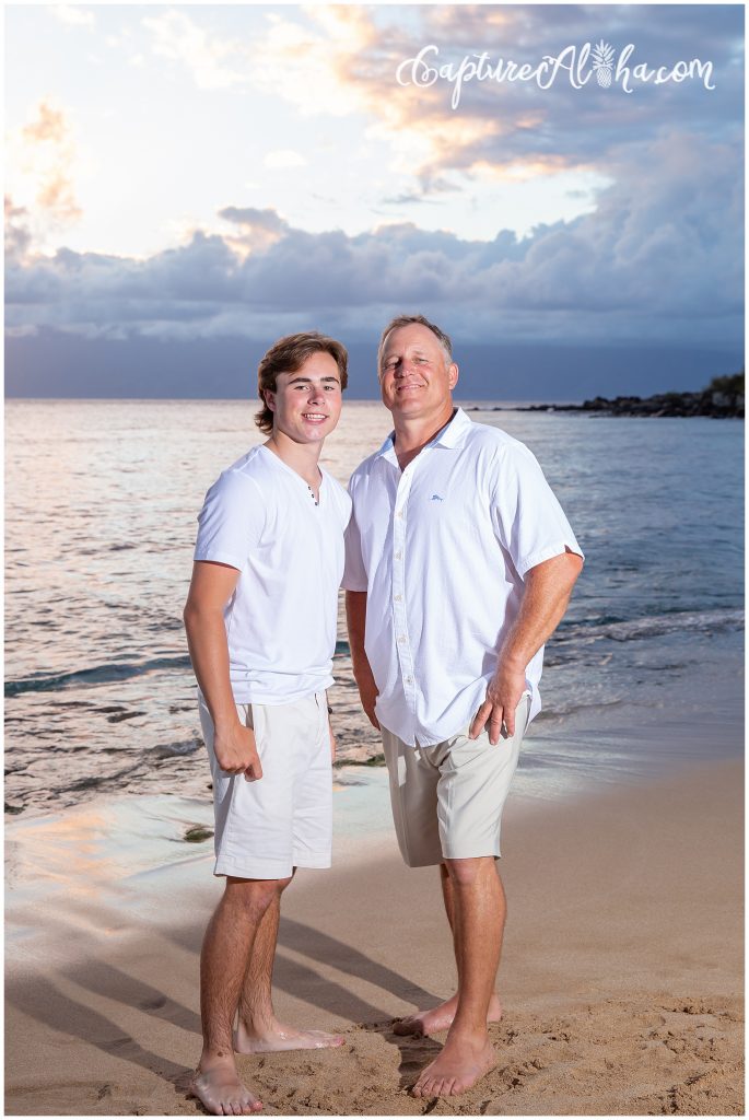 FamDad and son wearing white at Kapalua Bay beach on Maui
