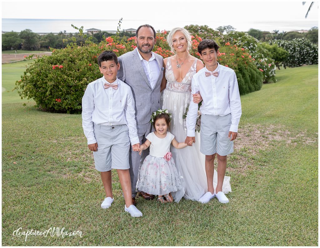 Bride, groom, and their children before their Maui wedding at Gannon's Wailea