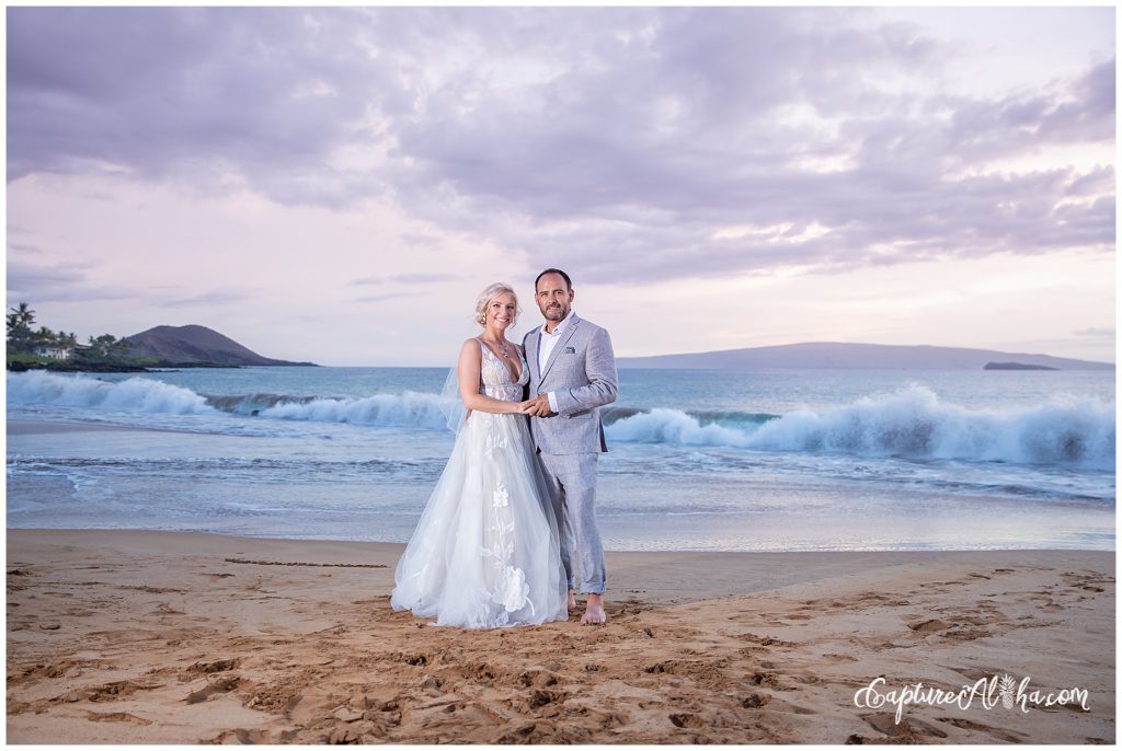 Bride and groom on Po'olenalena beach after their Maui Wedding | Gannon's Wailea
