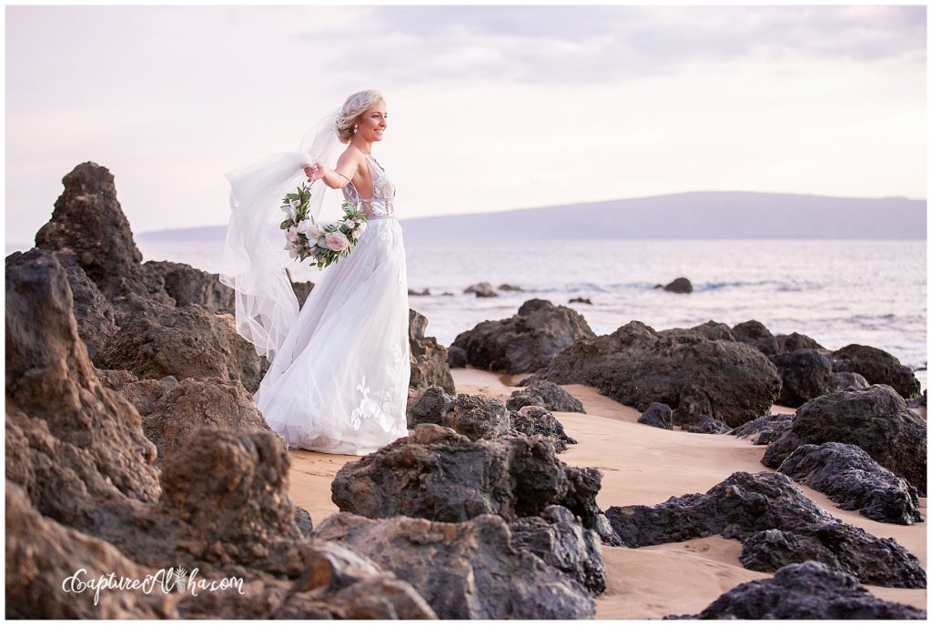 Bride and groom on Po'olenalena beach after their Maui Wedding | Gannon's Wailea