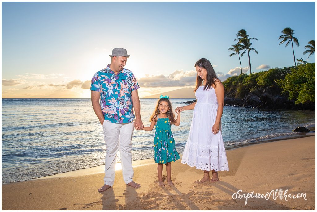 Maui Family Photography at Kapalua Bay Beach at sunset with a family of three
