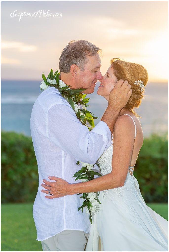 Wedding at The Cliff House Kapalua Bay bride and groom with sunset