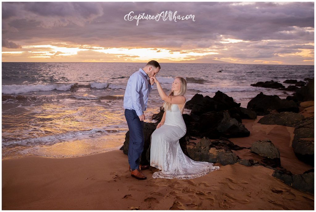 Maui Wedding Photography at Po'olenalena Beach, bride and groom by the lava rocks at sunset