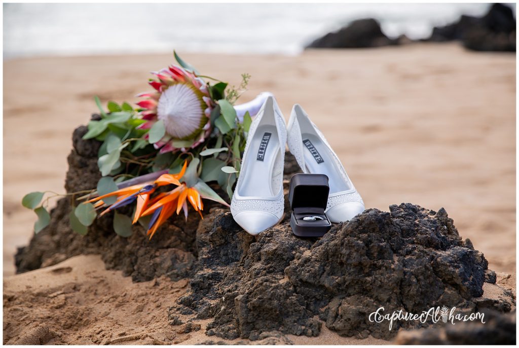 Wedding Photography at Po'olenalena Beach, close up of shoes and flowers