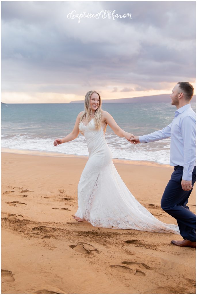 Maui Wedding Photography at Po'olenalena Beach, bride and groom walking on the beach