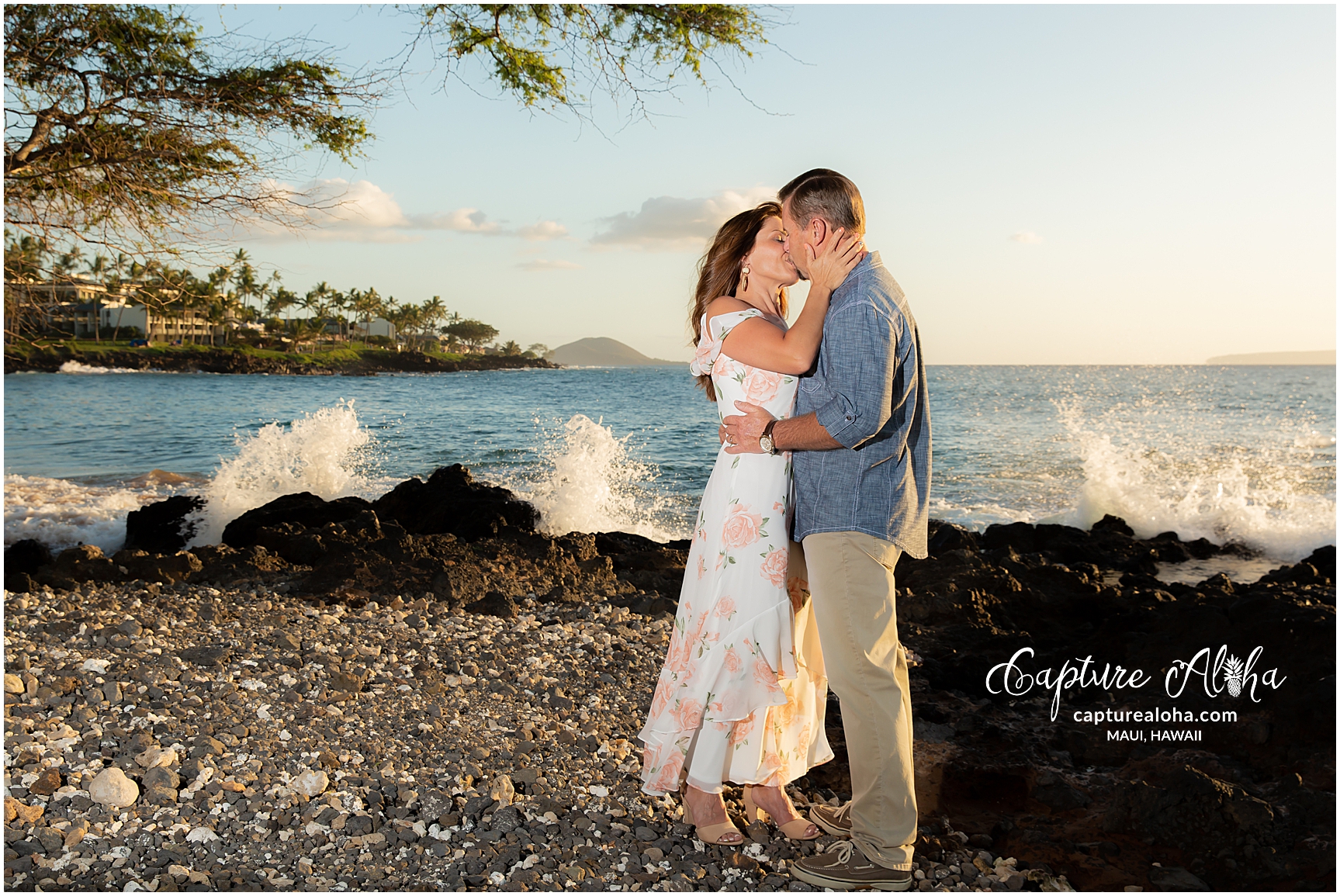 Maui Couples Photography at Mokapu Beach, Maui at sunset with couple kissing