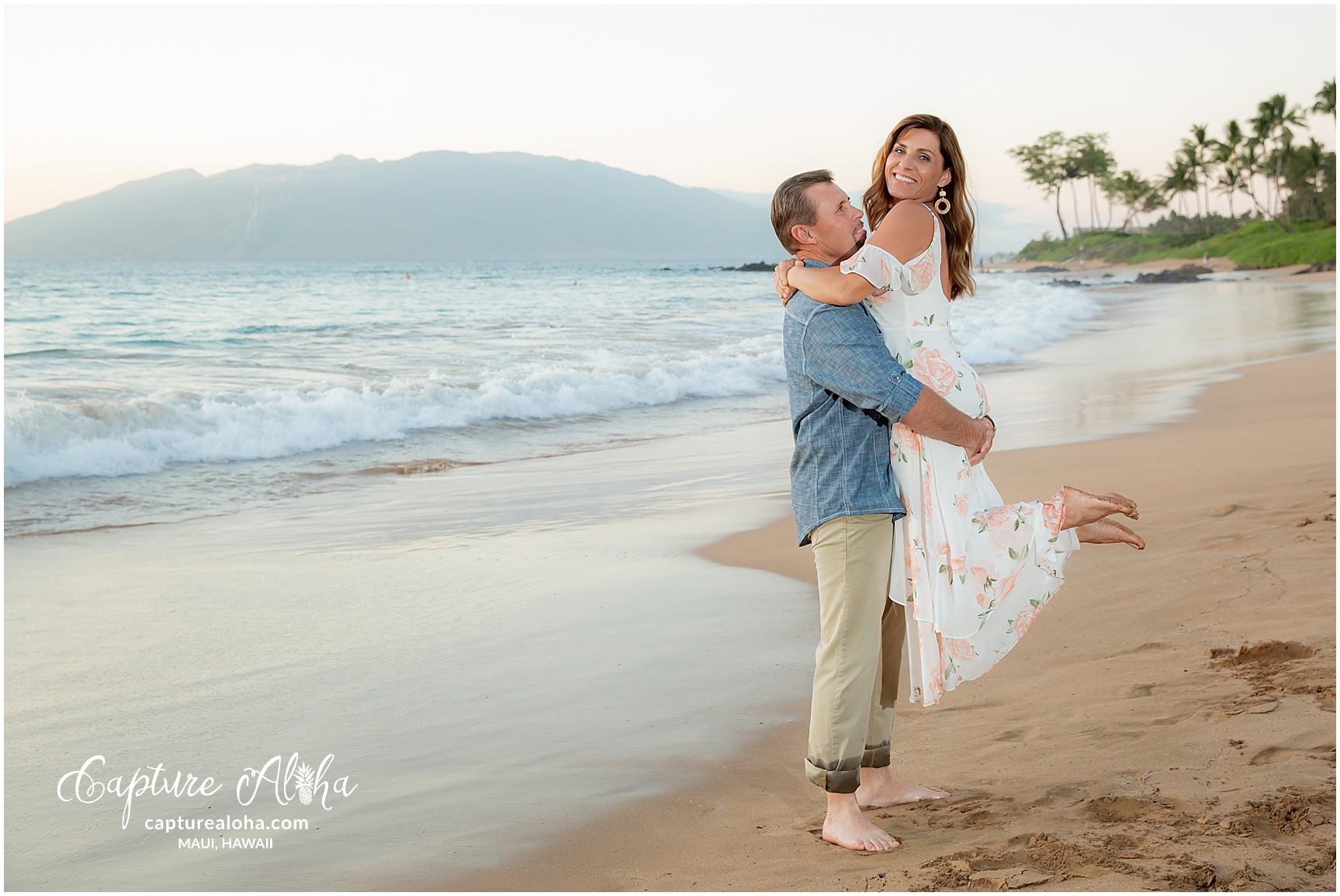 Maui Couples Photography at Mokapu Beach, Maui at sunset with couple on the beach