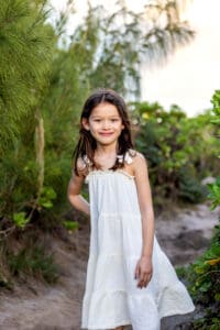 girl posing during maui sunset family portraits